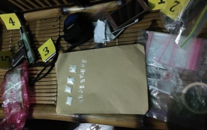 <p>The items seized from suspected drug peddler Jonel Gonzales in Kidapawan City who allegedly doubles as a fake asset of the Philippine Drug Enforcement Agency and Philippine National Police. <em><strong>(PDEA-12 photo)</strong></em></p>