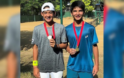<p><strong>CHAMPIONS.</strong> Filipino Matthew Anton Garcia (right) and Thai Tanapatt Nirundorn won the first leg of the Sri Lanka International Tennis Federation (ITF) Junior Circuit in Colombo last week. <em>(Contributed photo)</em></p>