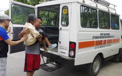 <p><strong>EVACUEE.</strong> An eldery woman in Batac City is evacuated as Typhoon Ompong is expected to hit northern Luzon. <em>(Photo courtesy of the Batac City Disaster Risk Reduction and Management Council)</em></p>