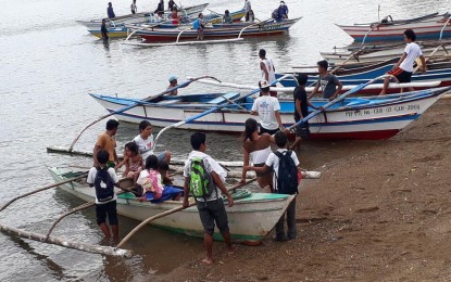 <p>The Municipal Disaster Risk Reduction and Management Office  of Nueva Valencia in Guimaras on Thursday (September 13, 2018) uses boats to evacuate 45 households from Unisan Island to the mainland of Brgy. Guiwanon as a precautionary measure for typhoon Ompong. <em>(Photo by LDRRM Officer Loren Gallarda)</em></p>