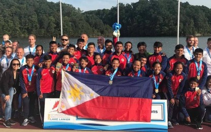 <p><strong>CHAMPIONS.</strong> The Filipino paddlers with their medals during the awarding ceremony at the Lake Lanier Olympic Park in Gainesville, Georgia on Saturday.<em> (Photo courtesy of  PCKDF)</em></p>