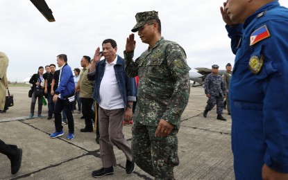 <p><strong>VISIT TO </strong><strong>TYPHOON-RAVAGED AREAS.</strong> President Rodrigo R. Duterte is welcomed by officials of the Armed Forces of the Philippines upon his arrival at the Cagayan Provincial Capitol in Tuguegarao City on September 16, 2018 for a situation briefing with the members of his cabinet and local government officials to discuss the disaster response measures on the aftermath of Typhoon "Ompong". <em>(Presidential Photo) </em></p>