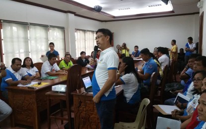 <p><strong>POST-DISASTER ASSESSMENT.</strong> Aurora PDRRMO head Amado Elson A. Egargue discusses updates on the impact of Typhoon Ompong in the province. <em>(Photo by Jason de Asis)</em></p>