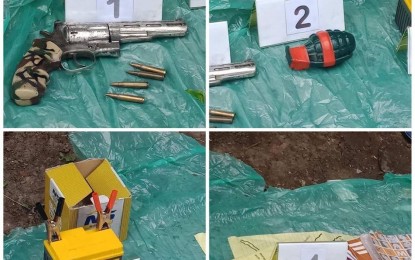 <p>Firearms, fragmentation grenade and other materials seized from the two New People's Army members  in Davao City on Friday. <em><strong>Photo courtesy of the DCPO PIO</strong></em></p>