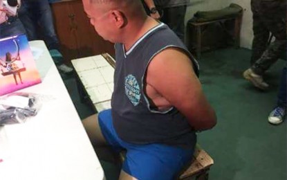 <p><strong>NABBED.</strong> The chief of police of Bocaue, Bulacan who was held on Saturday  for an alleged extortion and carnapping  activities inside the Bocaue police station. <em>(</em><em>Photo Courtesy of the Philippine National Police-Counter Intelligence Task Force (PNP-CITF).</em></p>