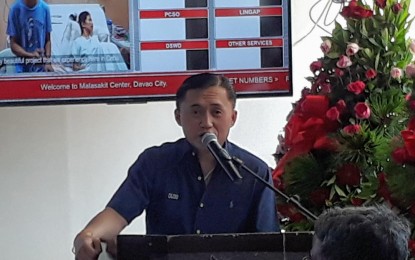 <p>Special Assistant to the President (SAP) Christopher Lawrence "Bong" Go explains the process of availing medical assistance during the opening of the Malasakit Center in davao City on Monday afternoon.<em> (Photo by Lilian C Mellejor/PNA)</em></p>