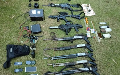 <p><strong>SEIZED HIGH-POWERED FIREARMS.</strong> Joint operatives of the Philippine Army and the National Bureau of Investigation seize high-powered firearms during a raid at a farm in Teresa, Rizal on Tuesday (Sept. 25, 2018). <em>(Photo courtesy of Philippine Army 2ID)</em></p>