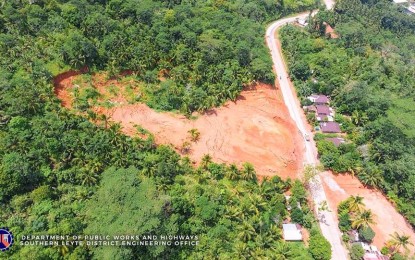<p>An aerial view of landslide-hit road section in Sogod, Southern Leyte. <em>(Photo courtesy of DPWH)</em></p>