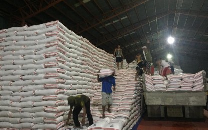 <p><strong>UNLOADING.</strong> NFA imported rice are being unloaded at the Kabasaka Triplex Warehouse in Jaro, Iloilo City. on Thursday (September 27, 2018).<em> (Photo courtesy of NFA-Iloilo)</em></p>
