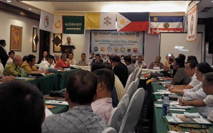 <p>Archbishop of Cotabato Cardinal Oscar Quevedo address the Moro leaders and Christian leaders during the two-day  peace dialogue held at the Waterfront Insular Hotel on September 27 and 28. <em><strong>Photo by Lilian C Mellejor/PNA</strong></em></p>