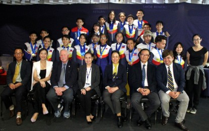 <p><strong>MEDALISTS.</strong> The winners of the 2018 Philippine Open Short Track Speed Skating Championships with Philippine Skating Union president Josie Veguillas (seated at center) after the awarding ceremony at the SM Megamall Ice Skating Rink in Mandaluyong City on Thursday.  The PSU organized the tournament to select the members of the national team.<em> (PNA photo by Jess Escaros)</em></p>