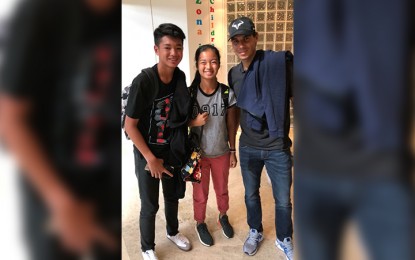 <p><strong>YOUNG TALENTS.</strong> Tennis players Michael Francis Eala (left) and sister Alexandra with world's No. 1 Rafael Nadal. The Eala siblings are in Spain attending the Rafa Nadal Academy in Mallorca. <em>(Photo courtesy of Mike Eala)</em></p>