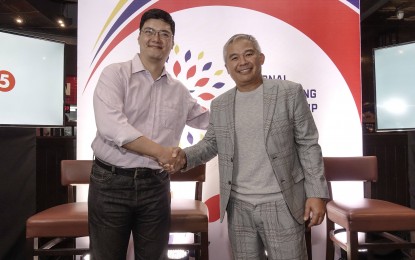 <p style="text-align: justify;">National Cheerleading Championship founder Carlos Valdes and ESPN 5 president Chot Reyes shake up as both the NCC and ESPN 5 team up anew for the 14th season of the said cheerleading competition. <em>(Contributed photo)</em></p>