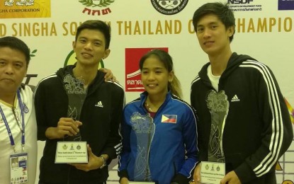 <p><strong>THIRD PLACE.</strong> Robert Garcia (second from left) finished third in the men's singles event of the 2nd Singha International Squash Thailand Open Championships which was held on September 27-30 in Chonburi. From left are coach Edgar Balleber, Garcia, Jemyca Aribao and  Reymark Begornia.<em> (Contributed photo)</em> </p>