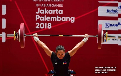 <p><strong>OLYMPIC GOLD HOPEFUL.</strong> Weightlifter Hidilyn Diaz seeks government support to fully train in her bid to possibly snatch the Philippines' first Olympic gold medal in Tokyo next year.  Diaz won a silver medal, the country's first silver in 20 years, in the 2016 Rio de Janeiro Olympic Games. <em>(File photo)</em></p>