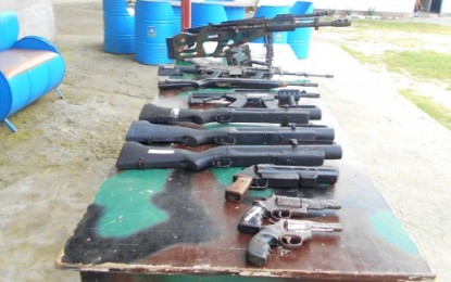 <p><strong>FIREARMS SURRENDER.</strong> The 11 firearms surrendered by civilians in the towns of Shariff Saydona Mustapha and Sultan sa Barongis as facilitated by their respective local officials on Monday (Oct. 1, 2018) at the headquarters of the Army’s 40th Infantry Battalion in Barangay Zapakan, Rajah Buayan, Maguindanao. <em><strong>(Photo courtesy of 6th ID)</strong></em></p>