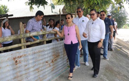 <p>Speaker Gloria Macapagal-Arroyo inspects the slope protection construction in Brgy. Maligaya, Floridablanca, Pampanga.<span data-ccp-props="{"201341983":0,"335559739":160,"335559740":259}"> <em>(Photo courtesy of the Speaker's Office)</em></span></p>