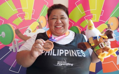 <p><strong>BRONZE MEDALIST.</strong> Paralypics powerlifter Adeline Dumapong-Ancheta captured the bronze medal in the women's over 86kg category at the 2018 Asian Para Games in Jakarta, Indonesia on Thursday.<em> (Photo courtesy of Jat Tenorio)</em></p>