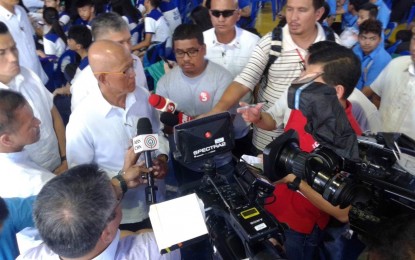 <p><strong>'RED OCTOBER' PLOT.</strong> National Defense (DND) Secretary Delfin Lorenzana tells journalists in an ambush interview, during  the "International Day for Disaster Reduction and ASEAN Day for Disaster Management Joint Celebration" at the Covered Court of Barangay Batasan Hills in Quezon City Friday (Oct. 12, 2018), that the 'Red October' plot is now 'dead'.<em>(Photo courtesy of Office of Civil Defense-PAO)</em></p>