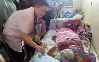 <p>Special Assistant to the President Christopher Lawrence "Bong" Go visits the elderly patients at the Zamboanga City Medical Center after leading the opening of the Malasakit Center in Zamboanga City Saturday. <em><strong>(Photo by Remus L. Ong)</strong></em></p>