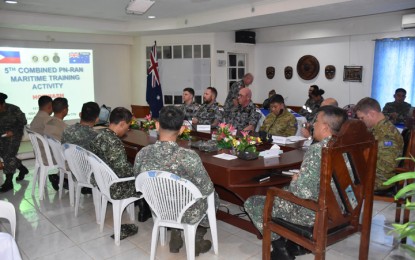 <p>5TH PN-RAN MARITIME TRAINING ACTIVITY: Naval Forces West (NFW) deputy commander for fleet operations Capt. Carlos Sabarre sits on the head table during one of the combined maritime exercise's sessions held at Naval Station Apolinario Jalandoon in Barangay San Miguel, Puerto Princesa City. <em>(Photo courtesy of Public Affairs Office, Naval Forces West)</em></p>