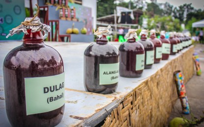 <p>'Tuba' wines readied for the tasting competition during last year's 'Oktubafest'. <em>(Photo courtesy of DOT Eastern Visaya</em>s) </p>