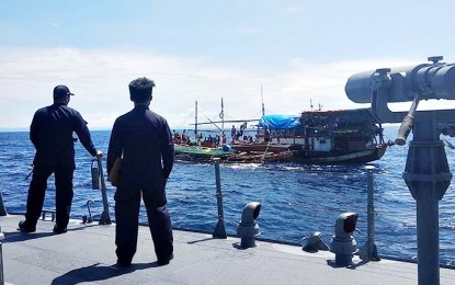 <p>ILLEGAL FISHING WITHIN MALAMPAYA GAS PLATFORM: Sailors of Philippine Navy vessel BRP Carlos Albert (PC 375) prepare to go near fishing boat Andrea-3 to conduct board and search after it was intercepted within the exclusion zone of the Malampaya deep-water gas-to-power project offshore Palawan. <em>(Photo courtesy of Wescom PAO)</em></p>