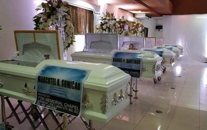 <p>The wake of the nine farmers massacred in Negros Occidental is held at the Sagay City Government Center.<em> (Photo courtesy of Bombo Radyo Bacolod)</em></p>