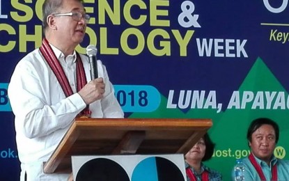 <p><strong>DOST SUPPORT.</strong> Department of Science and Technology (DOST) Secretary Fortunato dela Peña speaks at the opening of the Regional Science and Technology Week in Apayao province on Oct. 21, 2018, while Apayao Governor Elias Bulut Jr. (seated) listens. Dela Peña commited the DOST's support for the province through the development of its natural resources with the use of technology. <em>(Photo courtesy of Pamela Mariz Geminiano)</em></p>