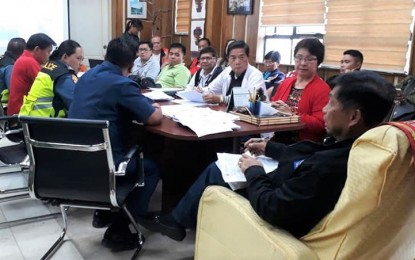 <p><strong>ON BLUE ALERT.</strong> Baguio City Mayor Mauricio Domogan orders members of the city disaster risk reduction and management council to prepare for the worse effect of Typhoon Yutu, during their meeting at his office on Friday (Oct. 26, 2018). “Yutu” is expected to enter the Philippine Area of Responsibility on Oct. 27 and make landfall on October 31.<em> (Photo courtesy of Aileen Refuerzo/PIO City Hall)</em></p>