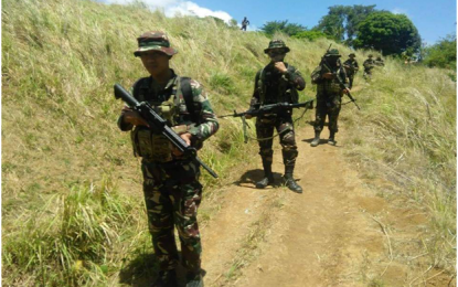 <p><strong>PURSUIT OPERATIONS</strong>. Troops of the 92nd Infantry Battalion, in close coordination with the local police force, conduct pursuit operations following two encounters with New People’s Army (NPA) rebels in the sub-villages of Dadyangao and Madaraki in Barangay Umiray in General Nakar town, Quezon Sunday (Nov. 4, 2018). <em>(Photo courtesy of 2ID-DPAO)</em></p>