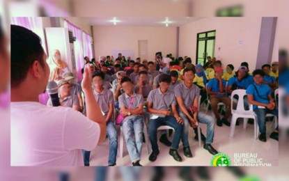 <p><strong>TESDA TRAINEES.</strong> Fifty-two former members of the Abu Sayyaf Group being briefed for the start of their skills development training on Friday (Nov. 8, 2018) in Isabela, Basilan, under the Technical Education and Skills Development Authority in coordination with the Program Against Violent Extremism thrust of the Autonomous Region in Muslim Mindanao. <em><strong>(Photo by BPI-ARMM)</strong></em></p>