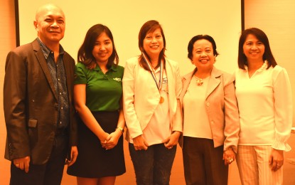 <p><strong>SOCIAL ENTERPRISE CHAMPION. </strong><br />Single mom and bead jewelry maker Delia ‘Dhel’ Gambol (center) is flanked by (from left) DTI Cavite Director Noly D. Guevara, a Go Negosyo representative, DTI Calabarzon Director Marilou Q. Toledo and DTI Cavite Division Chief Revelyn Cortez as she completes, along with 19 others, the DTI's ‘Kapatid Mentor ME,’ program in General Trias City on Nov. 15, 2018.<em> (Photo courtesy of DTI Region IV-A)</em></p>