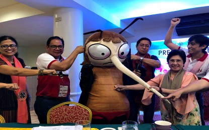 <p><strong>LAST BASTION OF MALARIA</strong>. Palawan officials are seen in this undated photo surrounding the anti-malaria campaign mascot. Health Secretary Teodoro Herbosa said the Philippines can be declared malaria-free as soon as the disease is eradicated in the province. <em>(PNA file photo)</em></p>