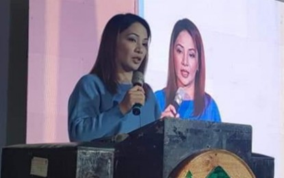 <p><strong>SK NATIONAL SUMMIT.</strong> Presidential Communications Operations Office Assistant Secretary, lawyer Marie Rafael, relays former Special Assistant to the President Christopher 'Bong' Go's message to the youth on Saturday (Nov. 24, 2018) at the first Sangguniang Kabataan National Summit, which runs from Nov. 23 to 26, 2018 in Baguio City.<em> (Photo courtesy of PCOO Asec. Marie Rafael)</em></p>