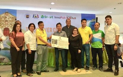 <p>The first batch of 20 local government units in Iloilo province receive their QR Code containing  tourist destinations in their locality. <em>(Photo by Perla Lena) </em></p>