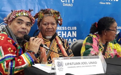 <p>Tribal leaders Lipatuan Joel Unad, the chairman of the Mindanao IPS Conference for Peace and Development (MIPCPD), translates for Datu Guibang Apuga during the Kapehan sa Dabaw at SM City Annex on Monday.<em> (PNA photo by Lilian C. Mellejor)</em></p>