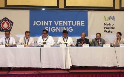 <p><strong>JOINT VENTURE.</strong> Metro Iloilo Water District  (MIWS) and the Metro Pacific Water (MPW)  signed on Thursday (December 6, 2018) a PHP12.35 billion joint venture project to improve services in seven municipalities and one city covered by the MIWD franchise. <em>(Photo by Cindy Ferrer) </em></p>