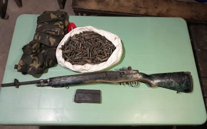 <p>Surrendered firearm and ammunition by former New People's Army members who yielded to military authorities. <em>(Photo by Jason de Asis)</em></p>