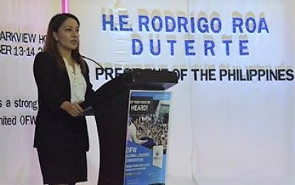 <p><strong>THE REAL SCORE.</strong> Presidential Communications Operations Office (PCOO) Assistant Secretary Marie Rafael speaks before members of the Overseas Filipino Workers Advocacy and Reform Movement Inc. in Baguio City on Thursday (Dec. 13, 2018). She urges the OFWs to tell each other the real score in the government's fight against drug abuse in the country and thereby fight the spread of fake news. <em>(Photo by Carlito Dar/PIA-CAR)</em></p>