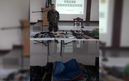 <p><strong>SEIZED WAR MATERIALS.</strong> Army 802<sup>nd</sup> Brigade commander Brig. Gen. Lope Dagoy presented to the media some of the firearms and other items recovered by the government after a clash with the New People's Army in Calubian, Leyte on Thursday (December 13, 2018). <em>(Photo courtesy of Army 802nd Infantry Brigade) </em></p>