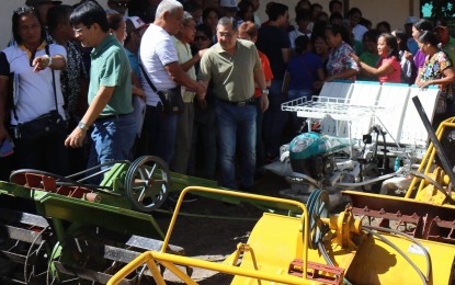 <p><strong>FARM EQUIPMENT.</strong> Bago City Mayor Nicholas Yulo (center) and Vice Mayor Ramon Torres (2<sup>nd</sup> from left) lead officials during the turn-over of the P4.2 million worth of farm machinery and livelihood projects at the City Agriculture Office in Barangay Balingasag on Thursday (December 13, 2018). <em>(Photo courtesy of the City of Bago)</em></p>
<p> </p>