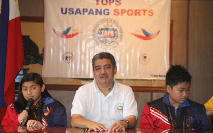 <p><strong>SWIMMING STANDOUTS.</strong> Micaela Jasmine Mojdeh (left) talks about her successful stint in Dubai during the  Tabloid Organization in Philippine Sports (TOPS) weekly forum at the National Press Club in Intramuros, Manila on Thursday (Dec. 13, 2018). Also in photo are swimmer Marc Bryan Dula (right) and TOPS president Ed Andaya, sports editor of People's Tonight. <em>(PNA photo by Jess Escaros)</em></p>