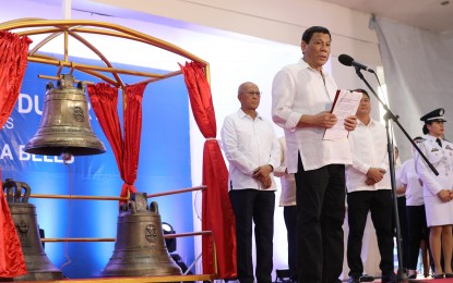 <p>President Rodrigo Roa Duterte delivers his speech after witnessing the official handover of the Transfer Certificate of the Balangiga Bells at the Balangiga Auditorium in Eastern Samar on December 15, 2018. <em>(Alfred Frias/Presidential Photo)</em></p>