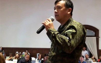 <p><strong>FULL ALERT VS. NPA.</strong> Colonel Henry Doyaoen, Armed Forces of the Philippines 503rd Infantry Brigade acting commander, says that military and law enforcers are on full alert against the communist New People's Army during the 4th quarter joint meeting of the Cordillera's Regional Development Council and Peace and Order Council in Baguio City on Wednesday (Dec. 19, 2018). <em>(Photo by Liza T. Agoot)</em></p>