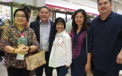 <p>Tourism Undersecretary Arturo Boncato Jr. (2<sup>nd</sup> from left) with Western Visayas Regional Director Helen Catalbas (left), Negros Occidental Provincial Supervising Tourism Operations Officer Cristine Mansinares (2<sup>nd</sup> from right), Bacolod City Tourism Officer Ma. Elma Gerasmo (center), and organic agriculture practitioner Ramon Uy Jr. at the opening of the 'Kaon Na ‘Ta' Food and Travel Festival at Ayala Malls Capitol Central in Bacolod City Wednesday afternoon (December 19, 2018). <em>(Photo by Nanette L. Guadalquiver)</em></p>