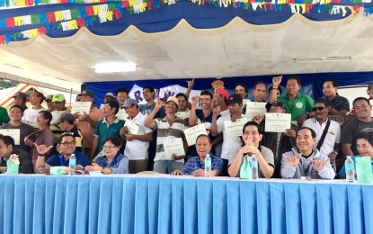 <p><strong>SOA GRADUATES.</strong> A total of 380 farmers in Western Visayas complete the School-on-the-Air (SOA) on dairy buffalo production on Thursday (December 20, 2018). <em>(Photo by Cindy Ferrer)</em></p>