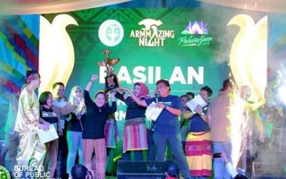 <p><strong>TOP WINNER.</strong> The province of Basilan emerges as grand prize winner during the culmination and awarding of prizes for Pakaradjaan 2018 on Wednesday night (Dec. 19) at Shariff Kabunsuan Complex in Cotabato City. <em><strong>(Photo courtesy of BPI-ARMM)</strong></em></p>