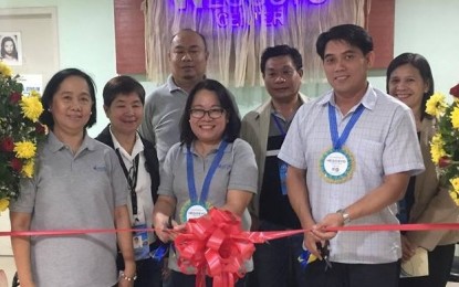 <p>DTI-Negros Occidental Provincial Director Lea Gonzales (center) and Councilor Thomas Maynard Ledesma (right) lead the inauguration of the Negosyo Center in Silay City on Thursday <em>(December 30, 2018).  (Photo courtesy of DTI-Negros Occidental) </em></p>