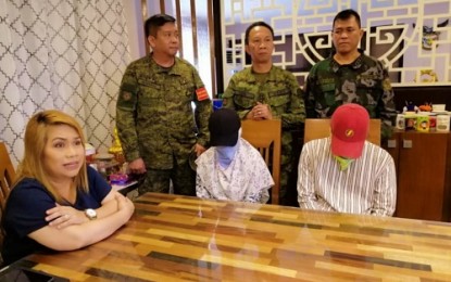 <p><strong>MAUTE SURRENDERERS.</strong> Two former Maute terror group members, both minors, are presented to the media by Cotabato City Mayor Frances Cynthia Guiani-Sayadi on Sunday (Dec. 23, 2018). <em>(Photo courtesy of Rowella Dayawan/Cotabato Media Group)</em></p>